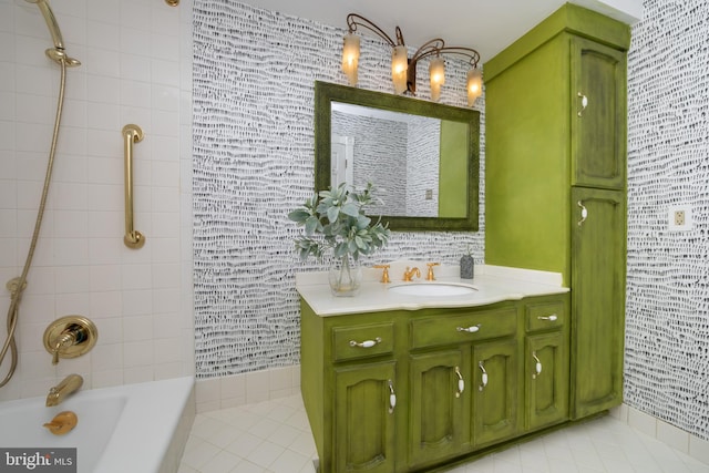 bathroom with shower / bathing tub combination and vanity