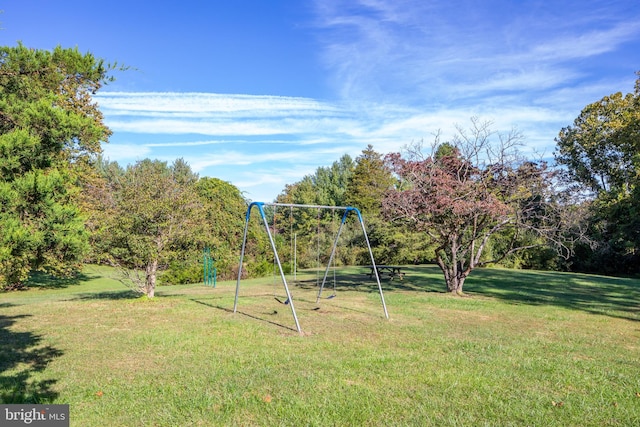 community play area featuring a yard