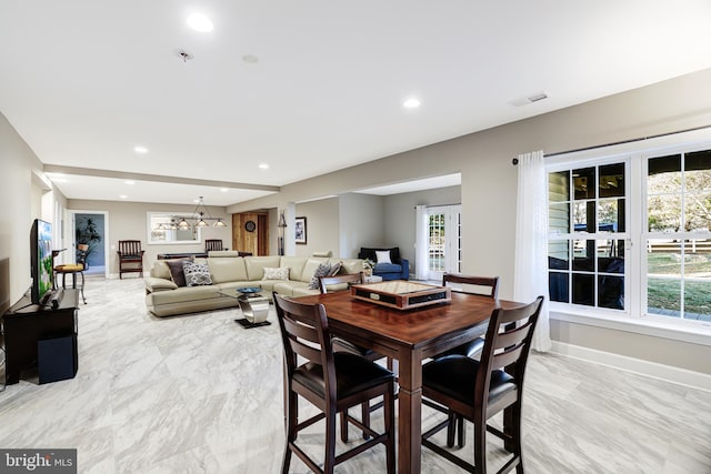 dining space featuring baseboards, marble finish floor, visible vents, and recessed lighting