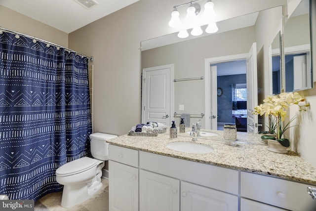 full bath featuring visible vents, vanity, toilet, and tile patterned floors