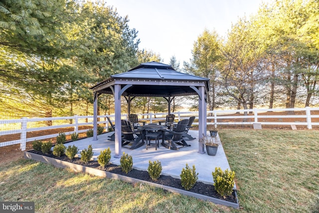 view of yard featuring a gazebo, a patio, and fence