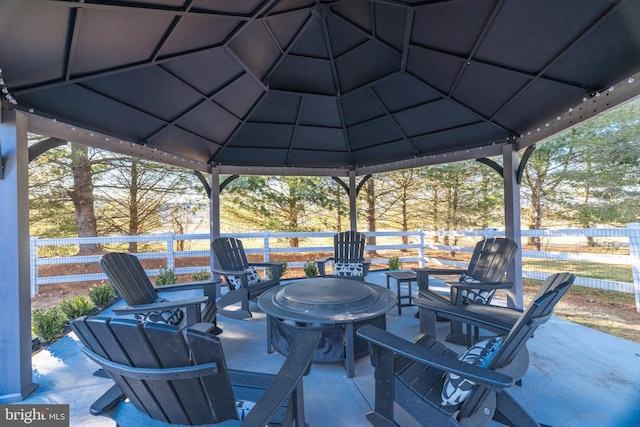 view of patio / terrace featuring fence and a gazebo