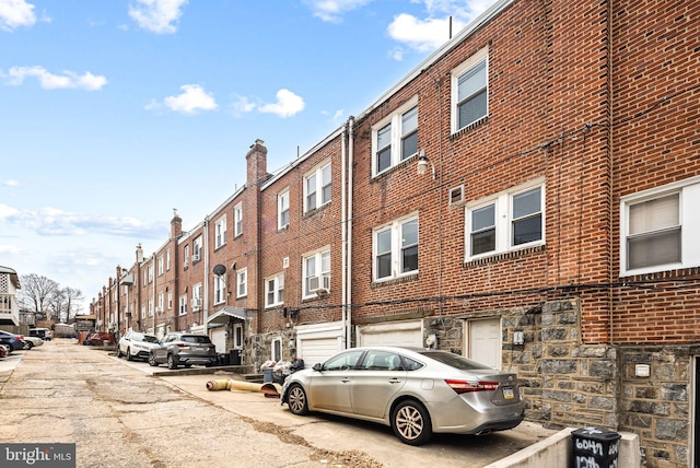 view of building exterior with a residential view