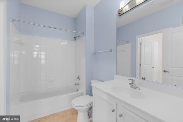 bathroom with  shower combination, tile patterned flooring, vanity, and toilet