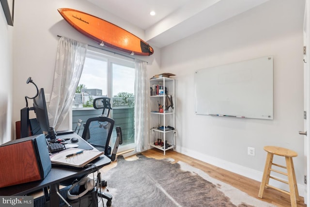 office space with recessed lighting, baseboards, and wood finished floors