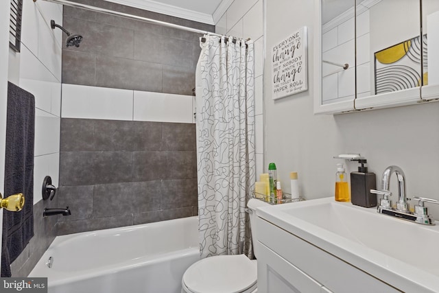 full bathroom featuring ornamental molding, shower / tub combo with curtain, vanity, and toilet