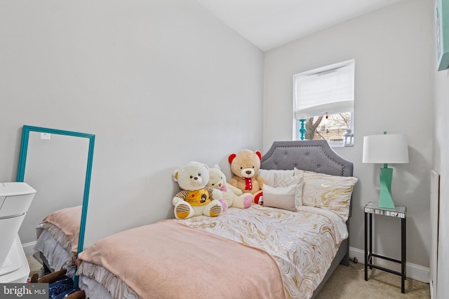 bedroom with carpet and baseboards