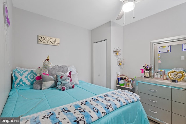 bedroom featuring a closet and ceiling fan