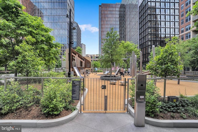 view of gate with fence