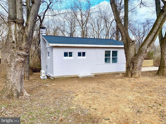 exterior space with an outbuilding