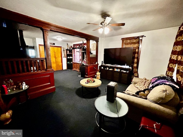 living room featuring carpet and ceiling fan