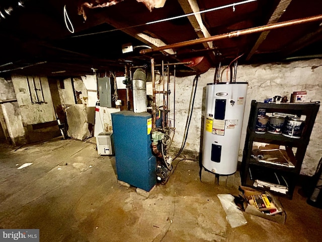 utility room with water heater and electric panel