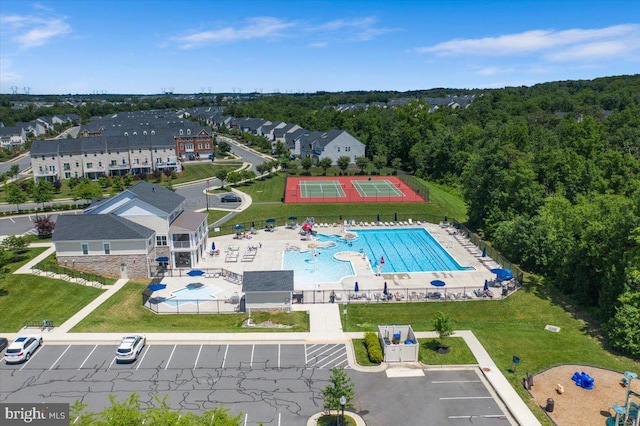 birds eye view of property with a residential view