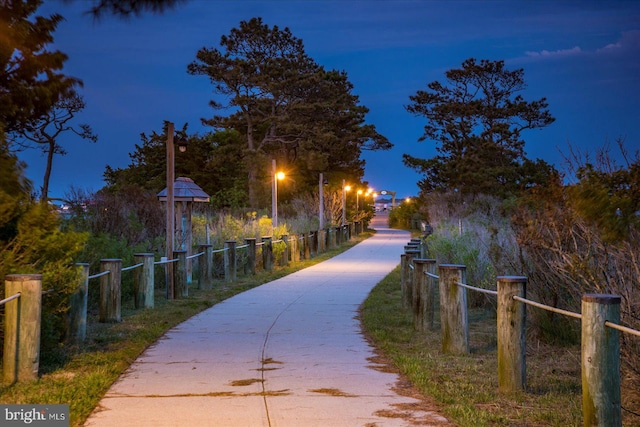 view of property's community with fence