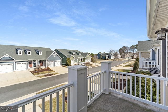 balcony with a residential view and covered porch