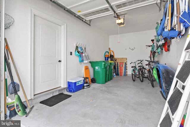 garage featuring a garage door opener