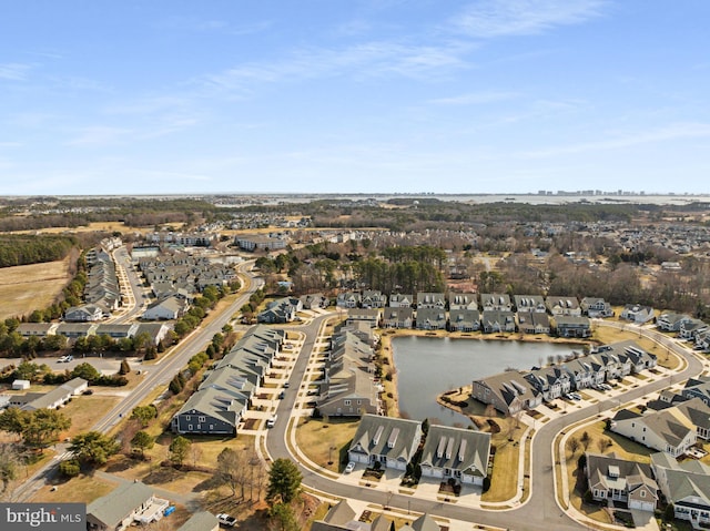 aerial view with a residential view and a water view