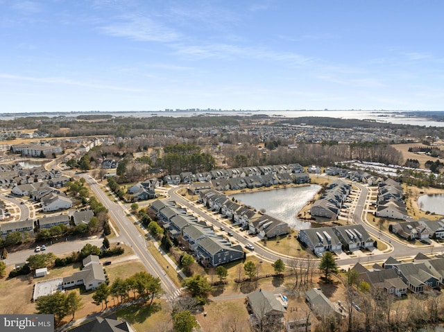 aerial view featuring a water view and a residential view