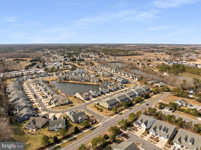 aerial view featuring a water view and a residential view