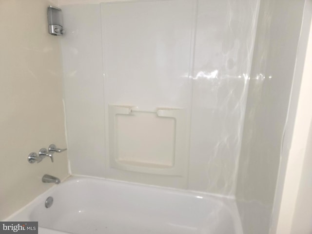 bathroom with shower / tub combination