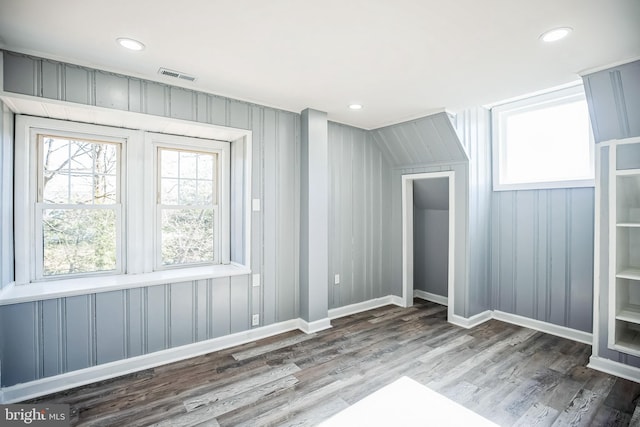 bonus room with visible vents, wood finished floors, and recessed lighting