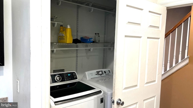 laundry room with laundry area and separate washer and dryer