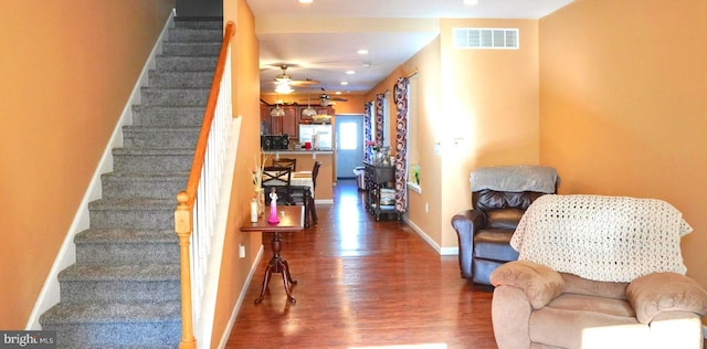 staircase featuring recessed lighting, visible vents, ceiling fan, wood finished floors, and baseboards