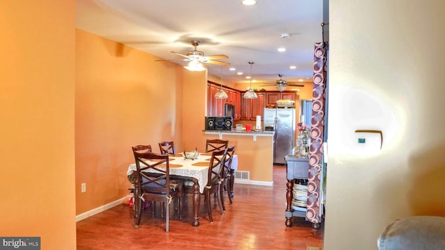 dining room featuring recessed lighting, visible vents, ceiling fan, wood finished floors, and baseboards