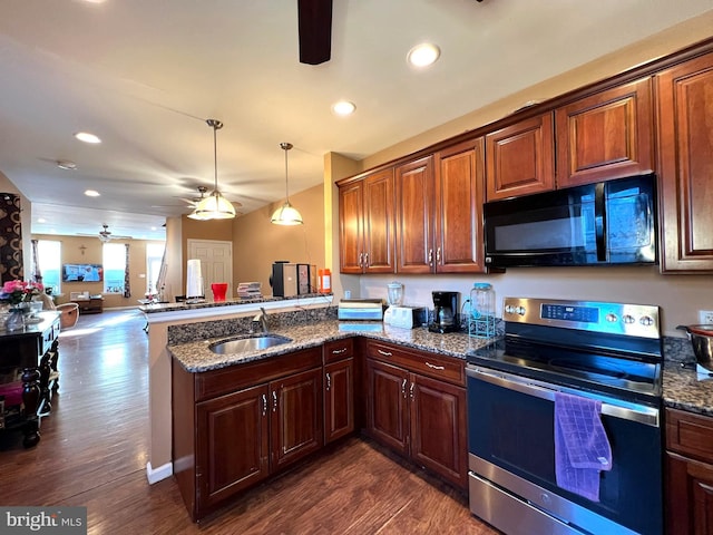 kitchen with black microwave, a peninsula, electric range, dark wood-style flooring, and a sink