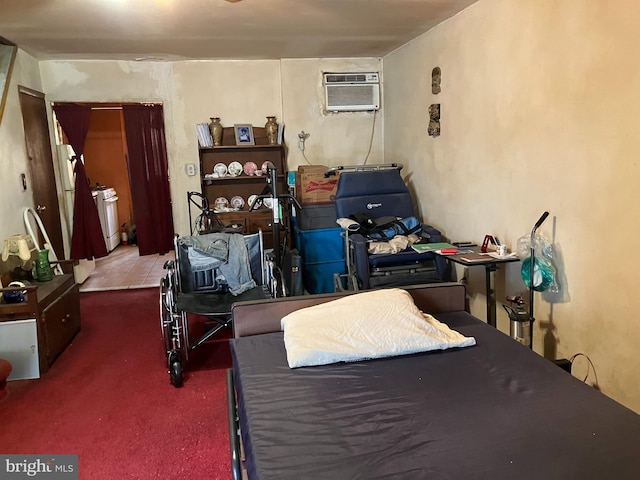 carpeted bedroom featuring a wall unit AC