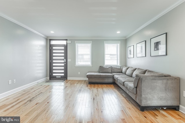 unfurnished living room with crown molding, recessed lighting, baseboards, and light wood-style floors