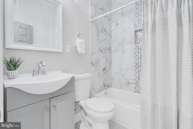 bathroom featuring toilet, visible vents, vanity, marble finish floor, and shower / tub combo with curtain