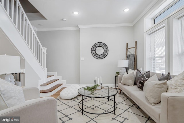 living room with baseboards, stairway, ornamental molding, light wood-type flooring, and recessed lighting