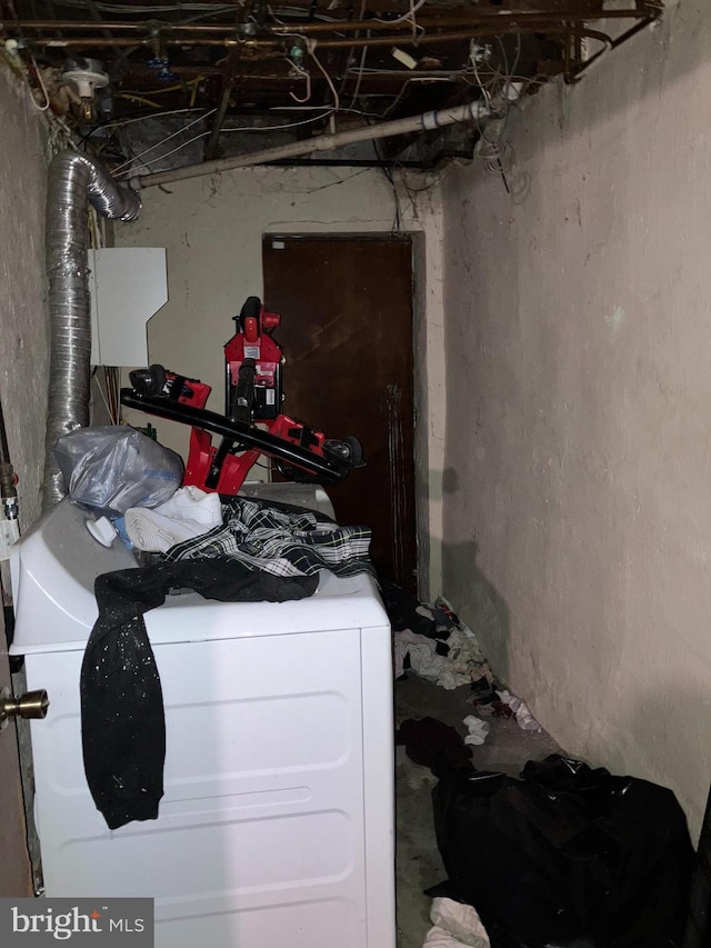 interior space featuring laundry area and washer / dryer