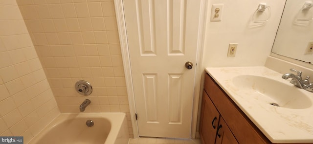 bathroom featuring tile patterned flooring and vanity