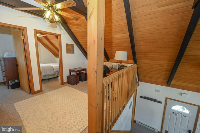 bonus room with vaulted ceiling with beams, wooden ceiling, light carpet, and a baseboard heating unit