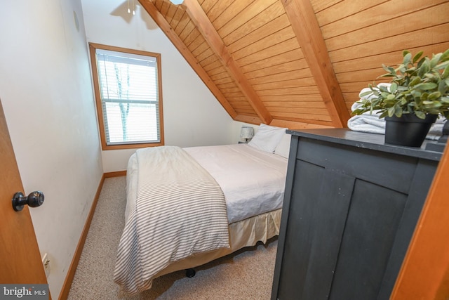 carpeted bedroom featuring wood ceiling, vaulted ceiling with beams, and baseboards