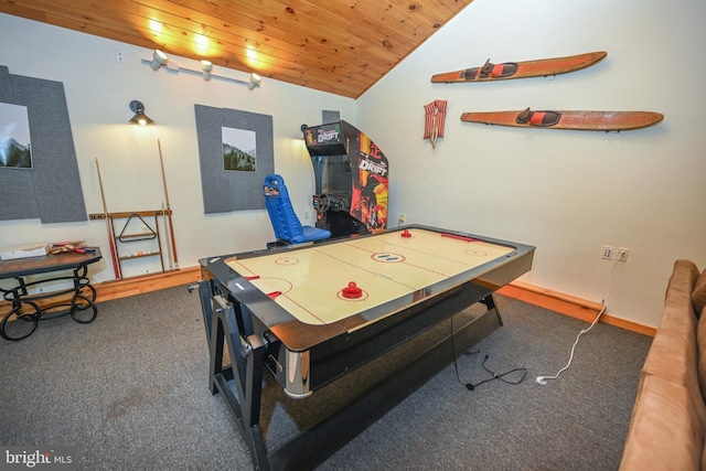 rec room featuring lofted ceiling, dark carpet, wood ceiling, and baseboards