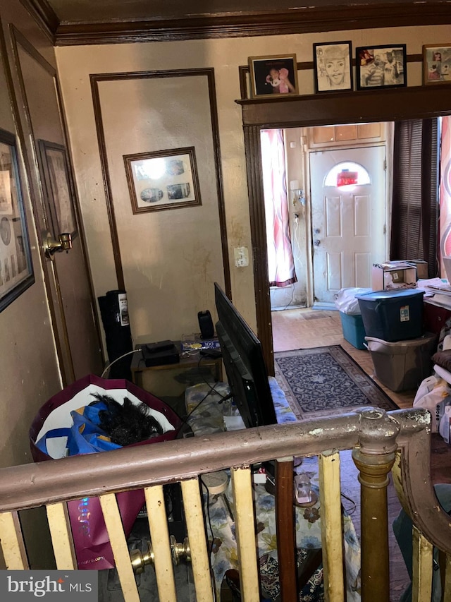 foyer with ornamental molding