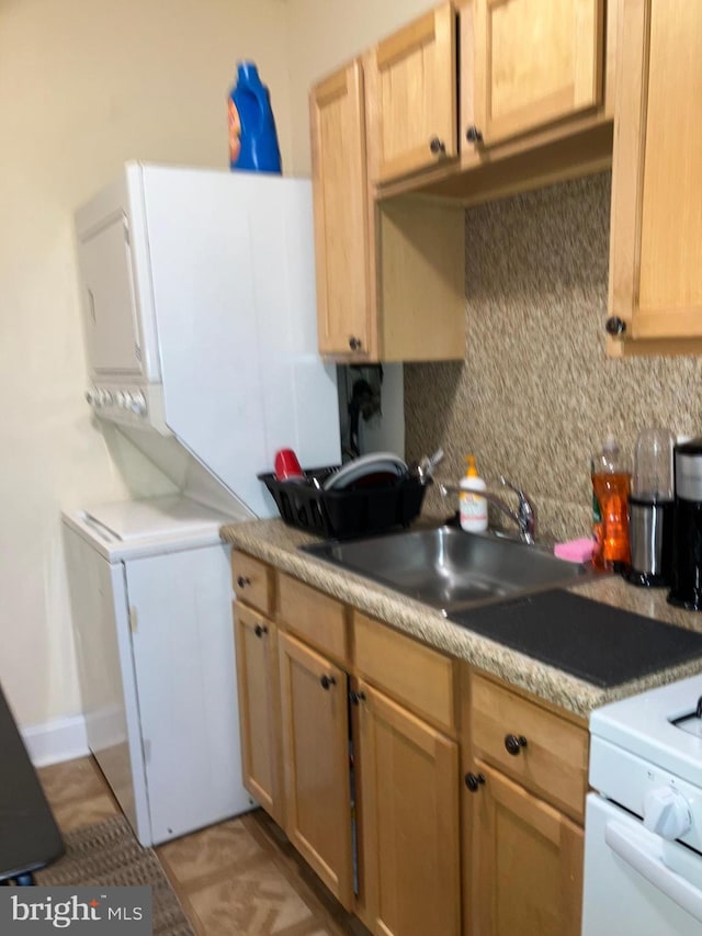 2516 S 6th St, Philadelphia, PA 19148 - kitchen featuring light countertops, tasteful backsplash, fridge, and white range with gas stovetop