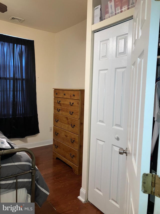 2516 S 6th St, Philadelphia, PA 19148 - bedroom featuring baseboards, a closet, visible vents, and wood finished floors