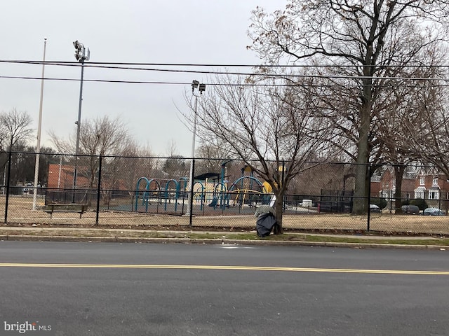 view of street featuring curbs and sidewalks