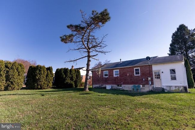 view of yard with entry steps