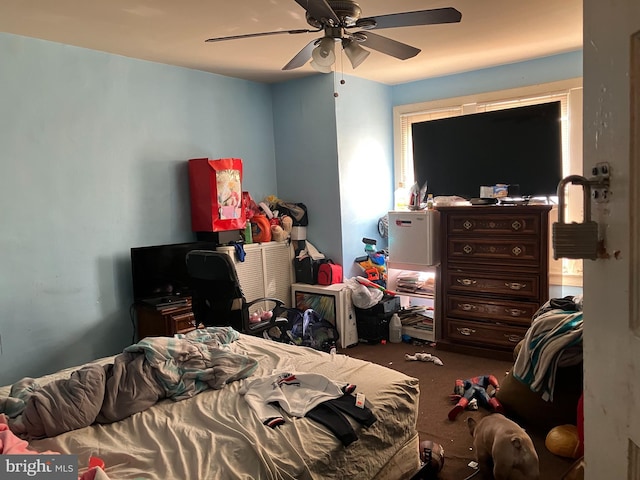 carpeted bedroom with ceiling fan