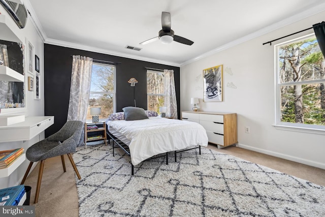 bedroom with light carpet, baseboards, visible vents, and ornamental molding