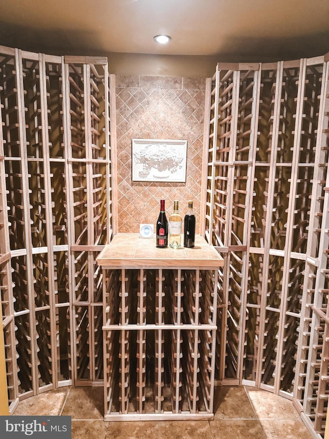 wine cellar featuring stone finish floor and recessed lighting