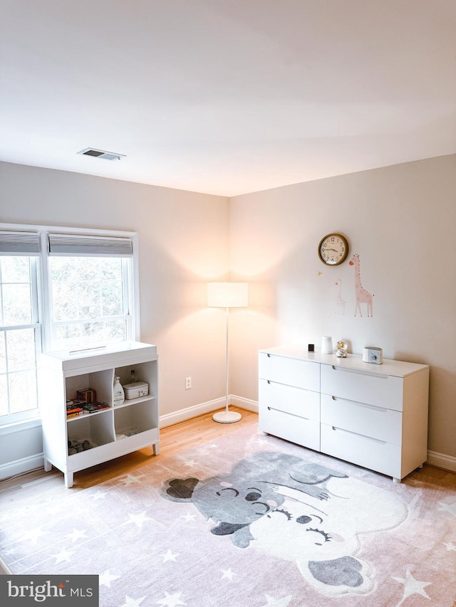 interior space featuring visible vents and baseboards