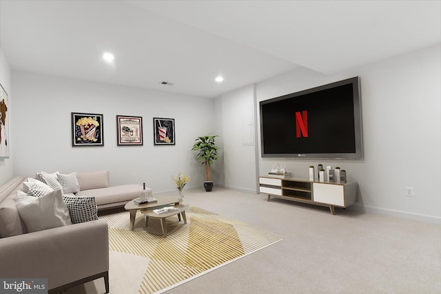 carpeted living room with baseboards, visible vents, and recessed lighting