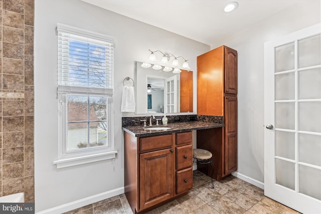 full bathroom featuring vanity, recessed lighting, baseboards, and ceiling fan