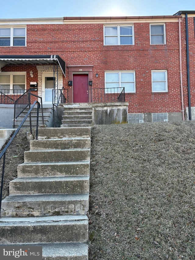 multi unit property featuring brick siding